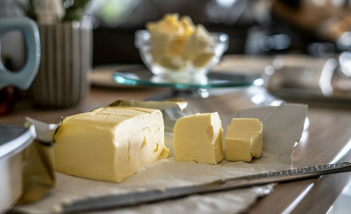 sliced cheese on clear glass plate